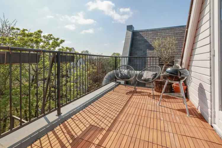 Luxe bovenwoning Amsterdam Pijp 2 slaapkamers dakterras