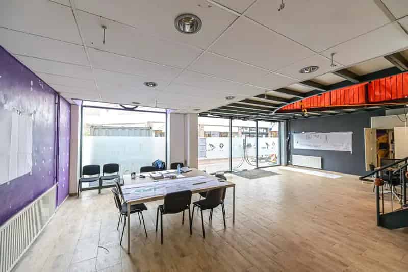 Belegging Tegelen: Kerkstraat 31-37 - Twee Commerciële Ruimtes & Twee Woningen