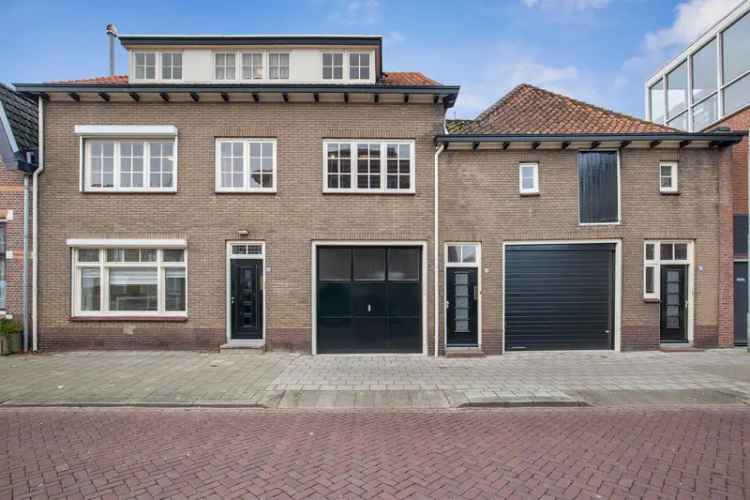 Zeer royale woning 400m2 te Goes met 2 garages en grote tuin