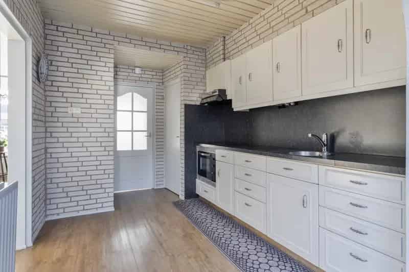 Uitgebouwde woning met hobbyruimte te Asten