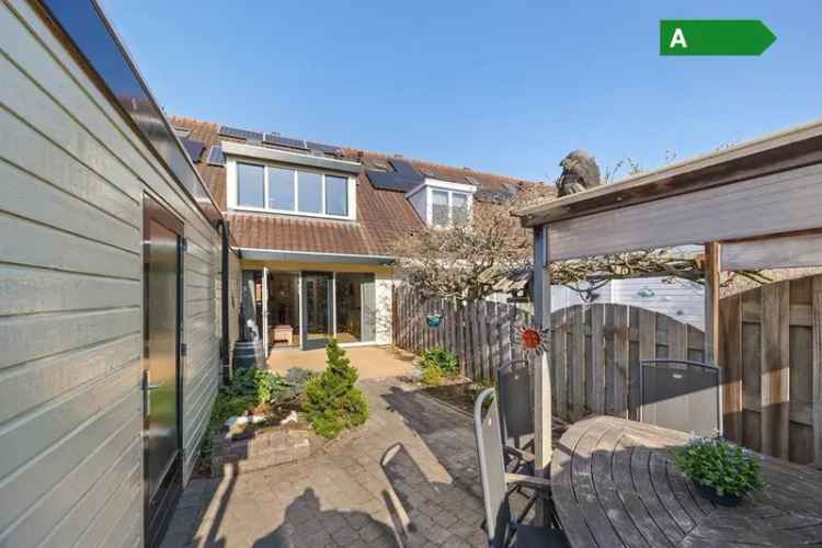 Tussenwoning 4 slaapkamers Diepe tuin Moderne keuken 15 zonnepanelen