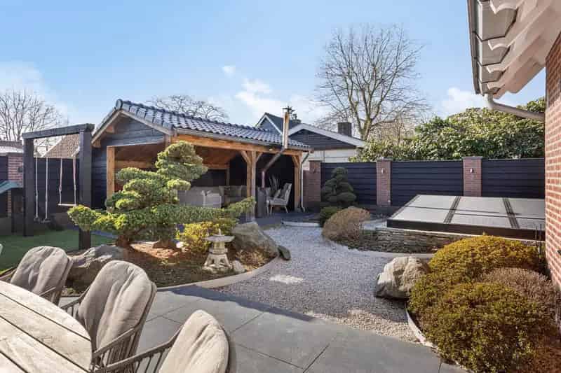 Jaren 50 woning Amerongen grote garage en tuin