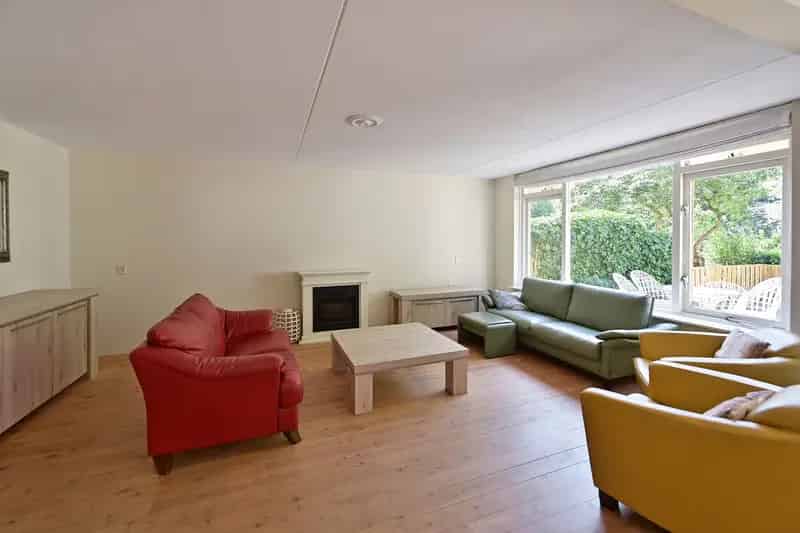 Appartement te koop Huizen: Ruime begane grond met tuin en berging