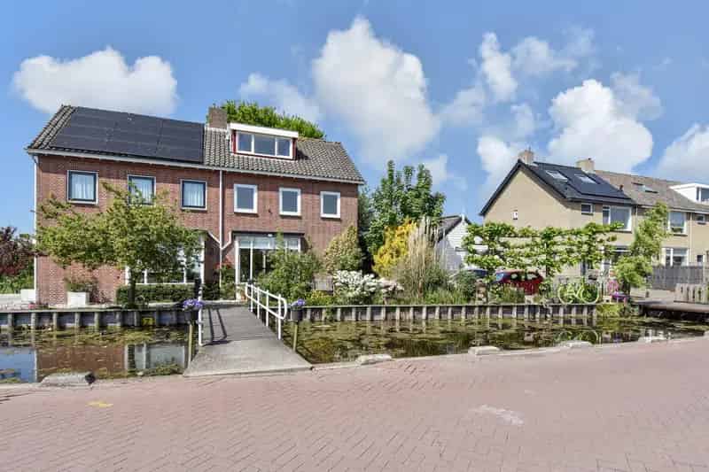 Landelijk gelegen 5-kamer woning met diepe tuin en souterrain