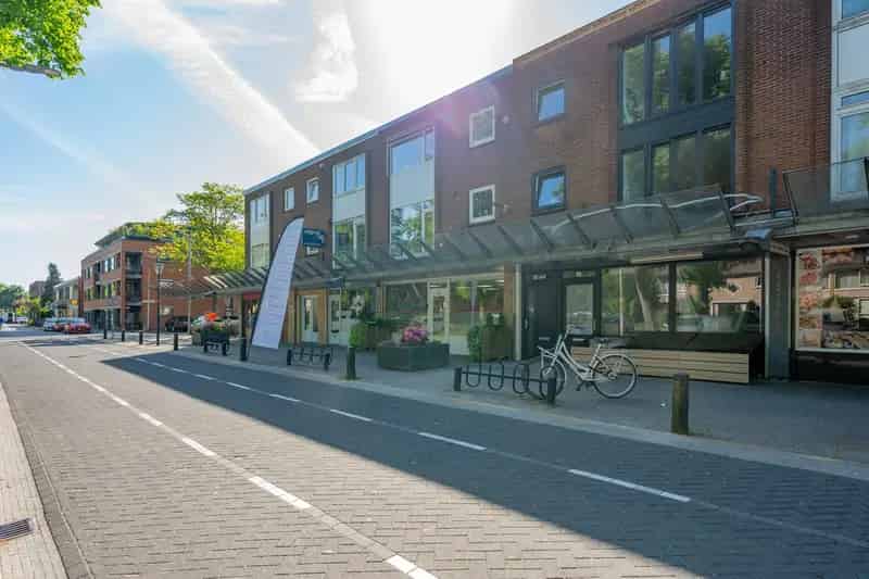 Winkel en Woning Zeist: Multifunctioneel pand met dakterras
