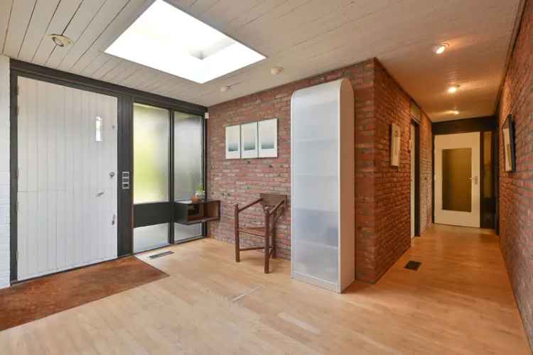 Huis te koop Muiderberg: Luxueuze Bungalow met Grote Tuin
