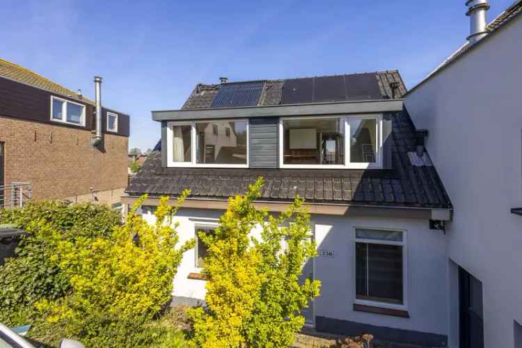 2-1 Kapwoning aan de Dijk met 4 slaapkamers en Zonnepanelen