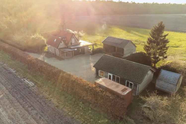 Huis te koop Beekbergen: uniek woonhuis met paardenstallen