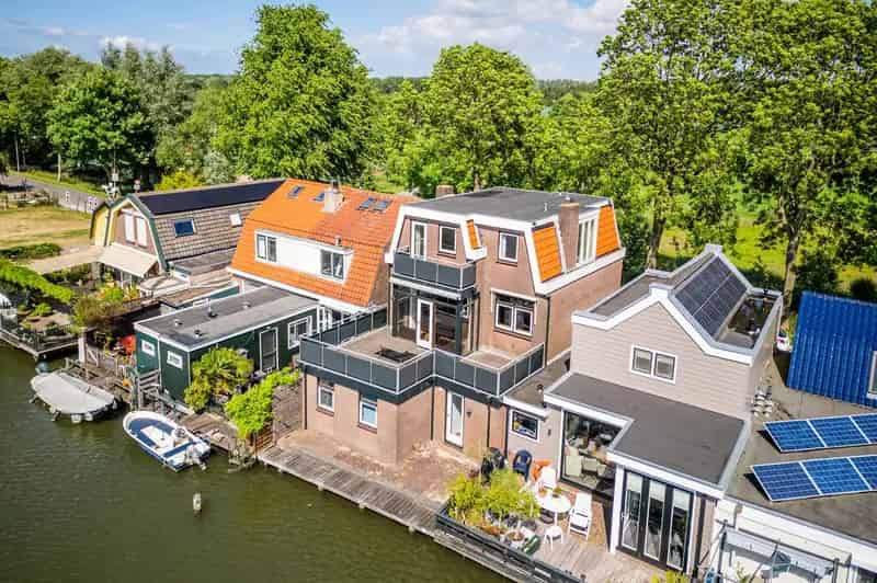 Vrijstaande woning Driemond aan het water