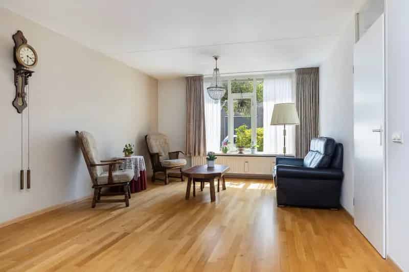Tussenwoning te koop Doorn: 2 badkamers, tuin en veranda