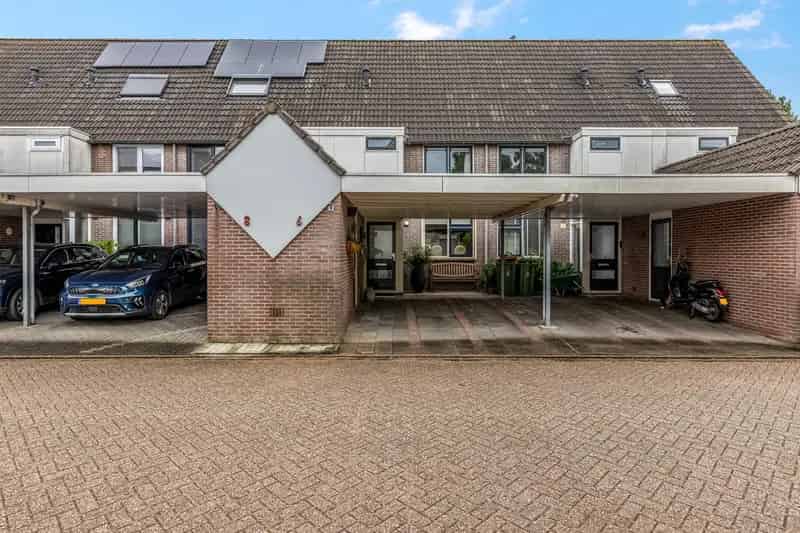 Huis te koop Ede: 4 slaapkamers, moderne keuken, tuin en carport