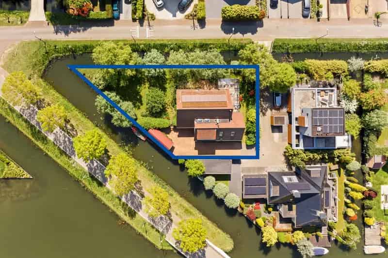 Huis te koop Rotterdam: Luxe villa aan het water met 6 kamers