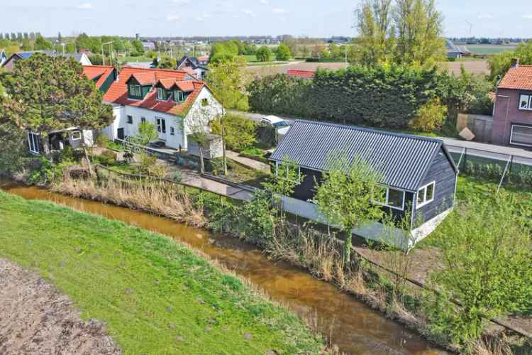 Unieke Dijkwoning met 915m² Grond en Prachtig Uitzicht