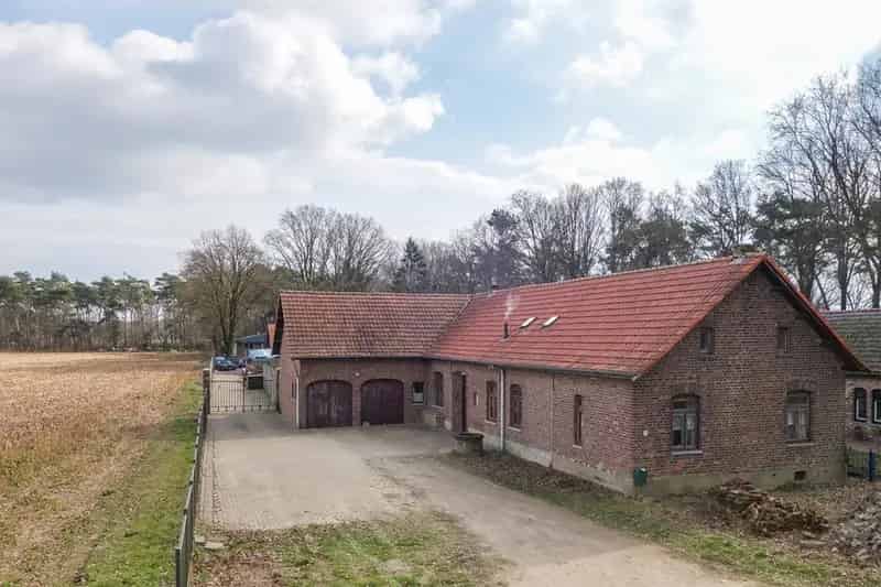 Boerderijwoning met Appartement en Loods te Koop