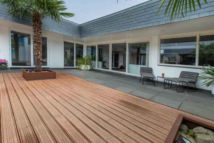 147m2 Bedrijfsruimte te Koop Woerden Bungalow Kantoor Garage