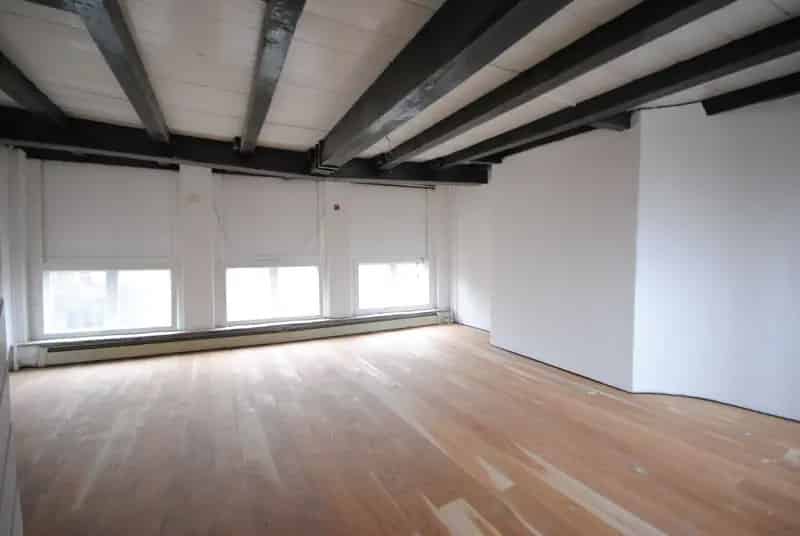 Grachtenpand Delft: Horeca en Wonen