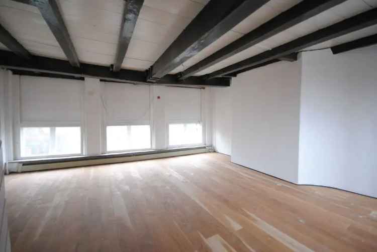 Grachtenpand Delft: Horeca en Wonen