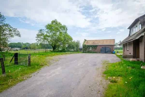 Landelijk wonen Steenwijk: Royaal Rietgedekt Landhuis met Gastenverblijf