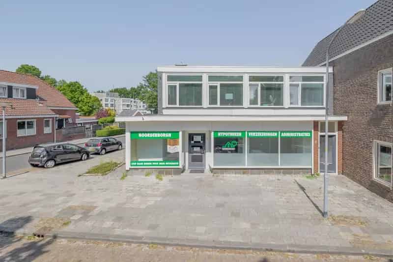 Bedrijfspand met Appartement te Koop Oude Pekela