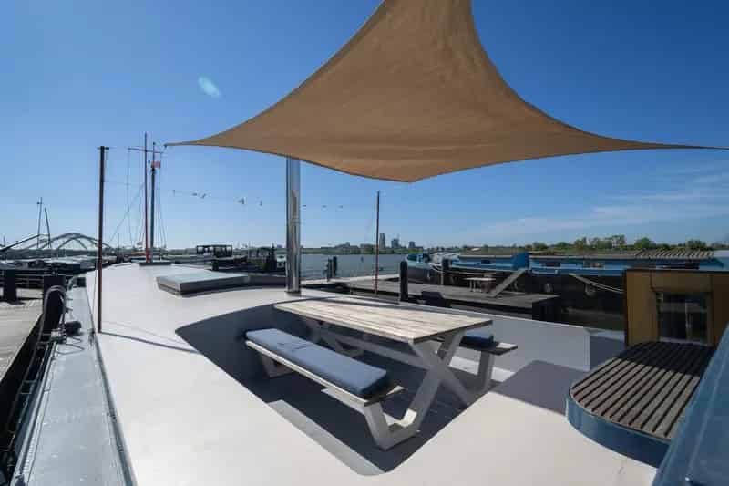 Luxe Woonschip Amsterdam Sluishuis 3 slaapkamers duurzaam