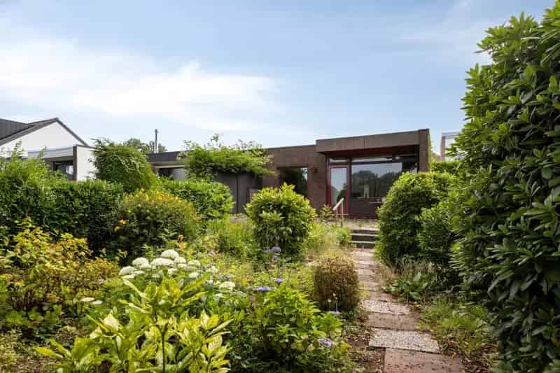 Renovatieproject Wijlre: 80m² woning, 2 slaapkamers, garage, tuin