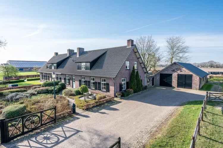 Bedrijfshal Someren: Woning met bedrijfsgebouwen te koop