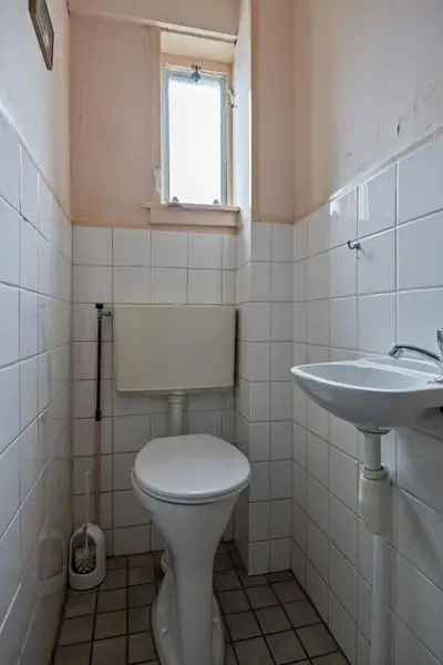 Jaren 20 woning te koop Schiebroek 3 slaapkamers diepe tuin