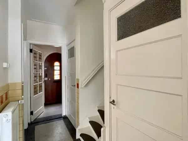 Jaren 30 woning Nijmegen Oost: Royale woonkamer en zonnige tuin