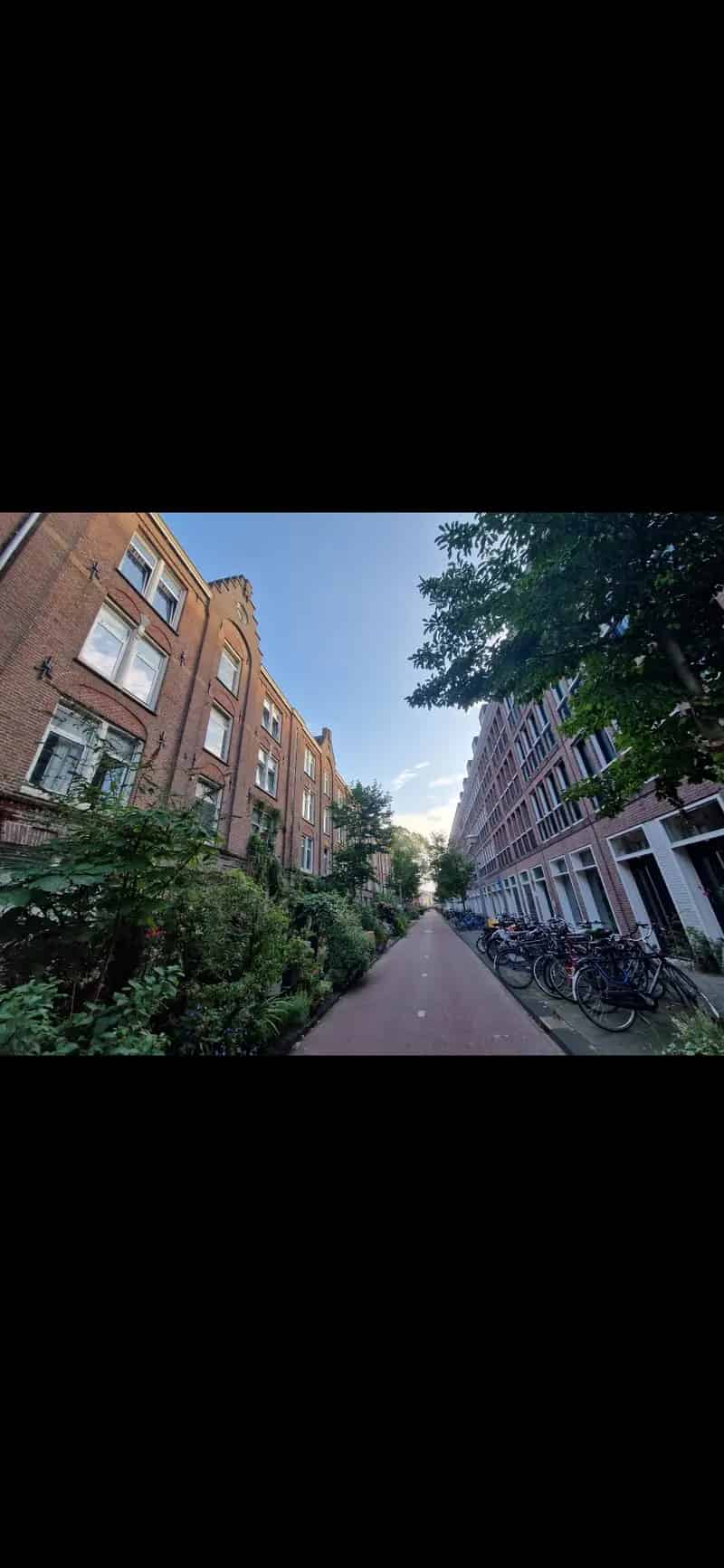 Kamer in ruim appartement met grachtenzicht nabij CS