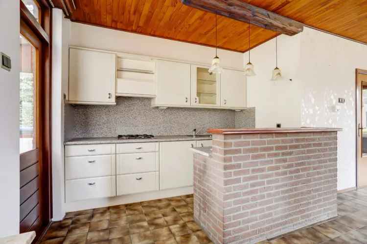 Vrijstaande woning met tuin en garage te Putte