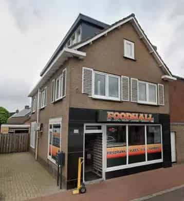Winkel met appartementen te koop