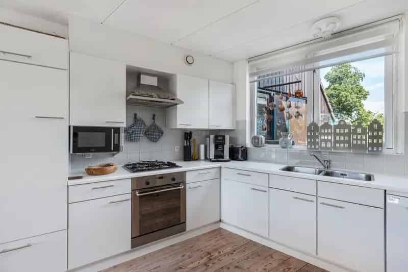 Aan het water wonen Lemmer: Tussenwoning met aanlegsteiger