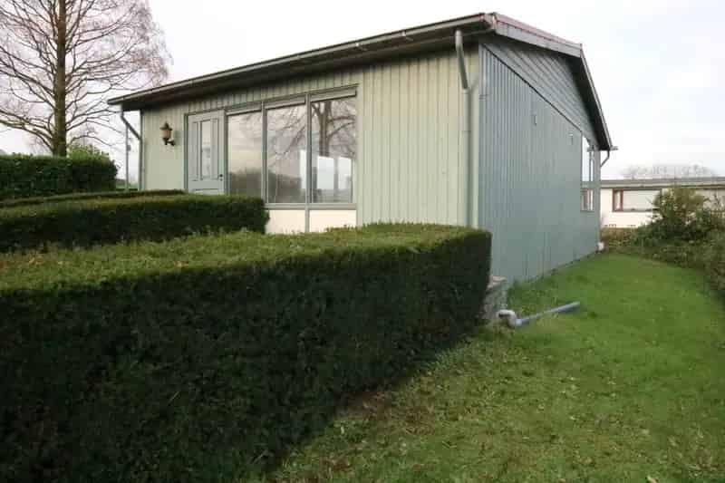 Recreatiechalet met grote garage te koop
