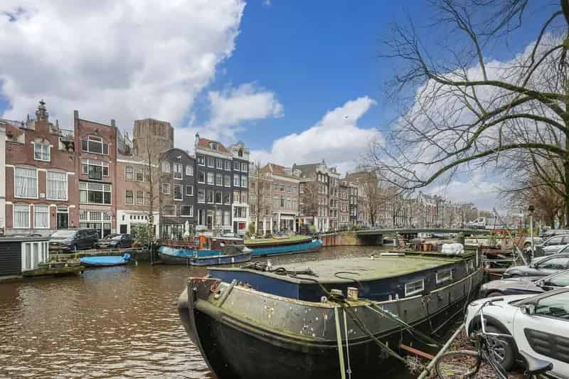 Woonboot te koop Amsterdam Singel - Uniek object met renovatie mogelijkheden