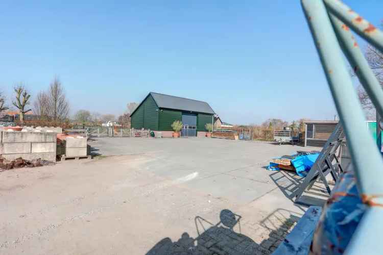 Bedrijfshal Angeren te koop: Moderne hal met buitenterrein