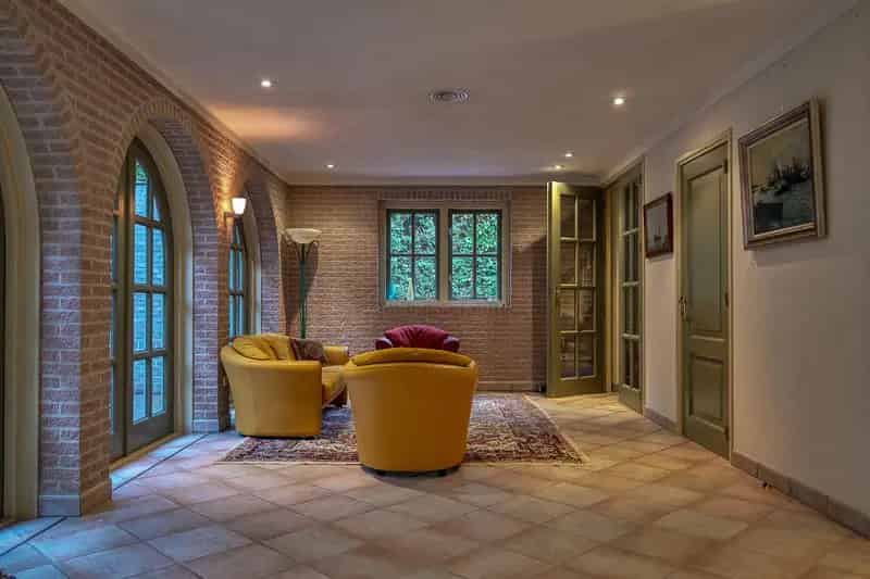 Villa De Brem Oosterbeek: Luxe villa met binnenzwembad in bosrijke omgeving