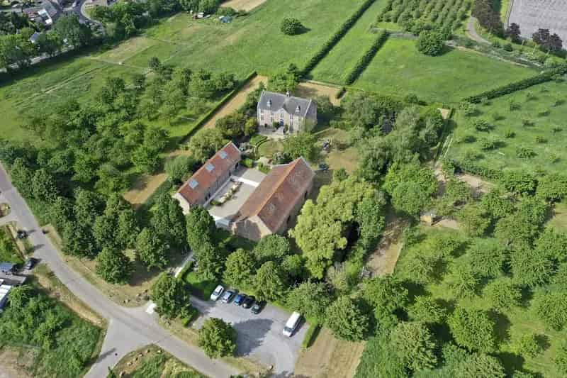 Herenhuis Holtum te koop: historisch landgoed met bijgebouwen