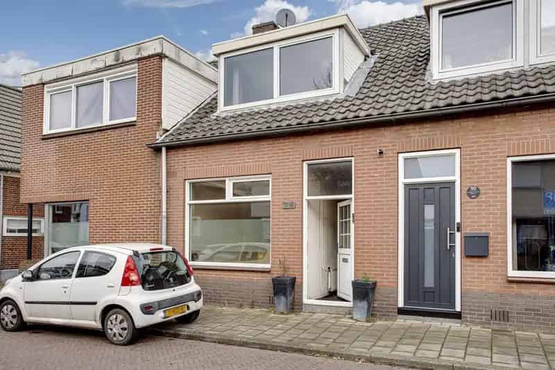 Ruime Tussenwoning 310m² Perceel Diepe Tuin 40m Garage Mogelijkheid
