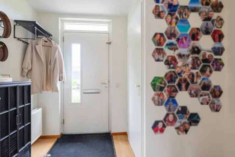 Nette tussenwoning Almkerk 3 slaapkamers moderne keuken tuin