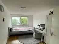 Kamer Rotterdam: Eenpersoonskamer met gedeelde keuken en tuin