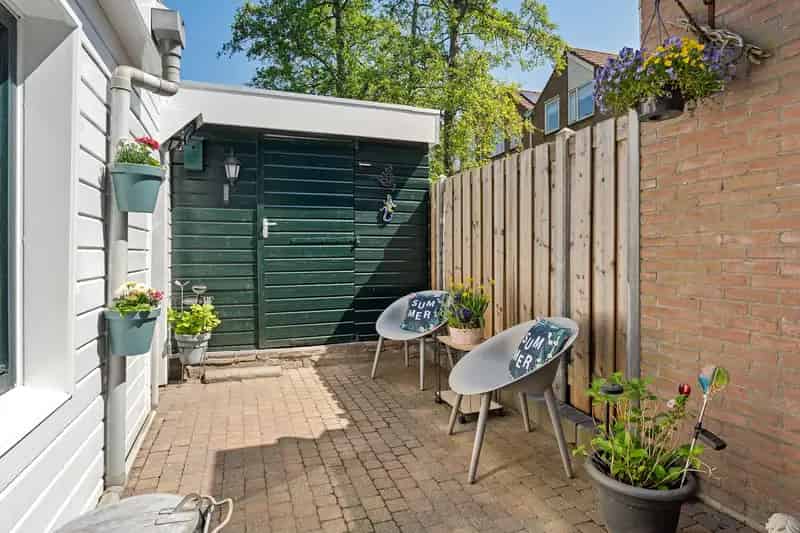 Huis te koop Vlaardingen: 3 slaapkamers, tuin, berging, airco