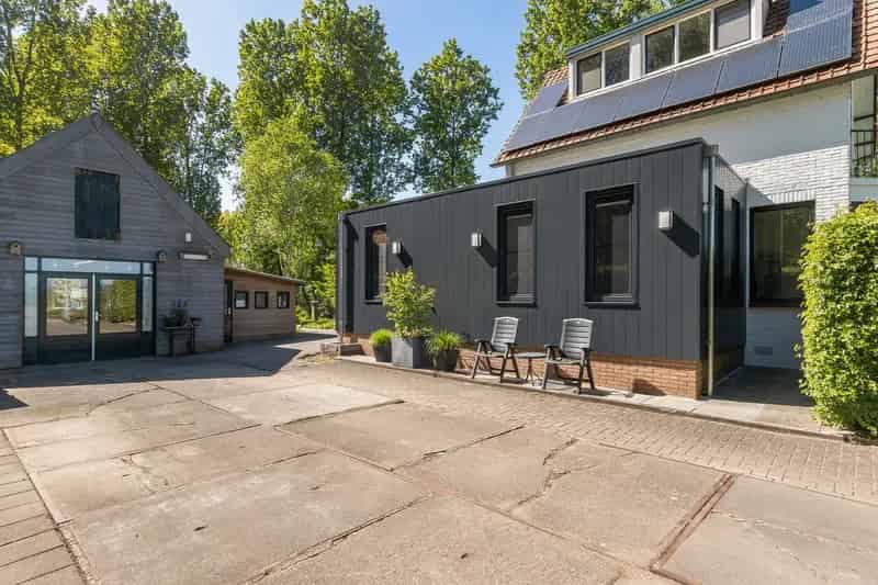 Vrijstaand Huis Dordrecht: Moderne woning met atelier en grote tuin