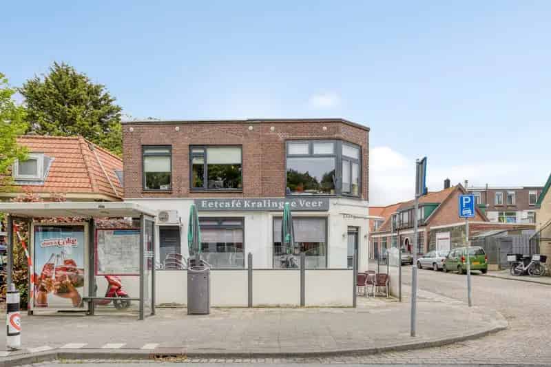 Horecapand met 2 woningen te Rotterdam Kralingseveer