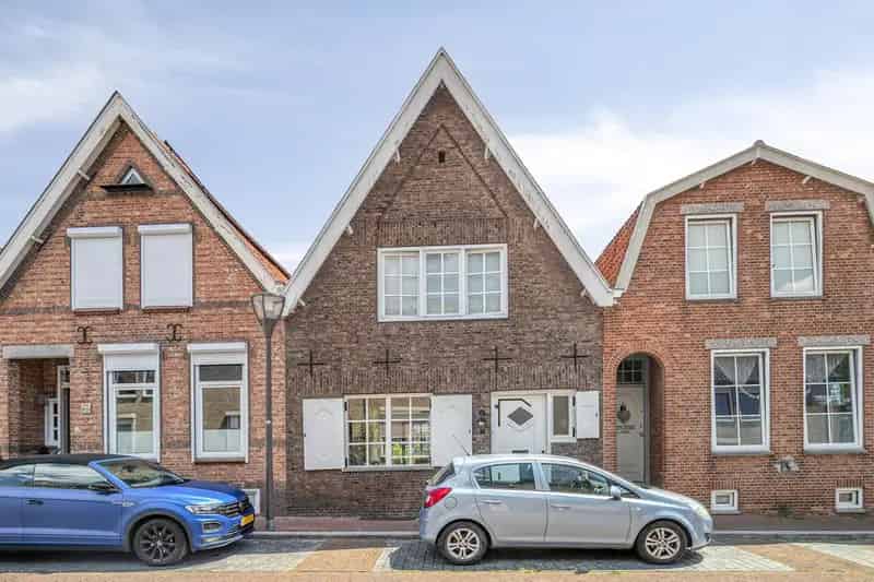 Jaren 30 woning Hulst: Sfeervol modern huis met tuin en souterrain