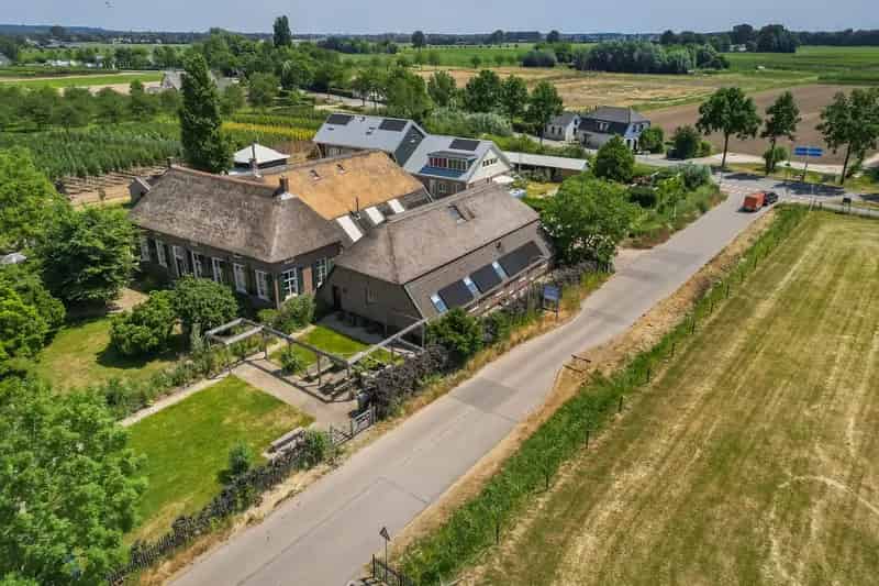 Woonboerderij Randwijk: Rijksmonument met Moderne Luxe