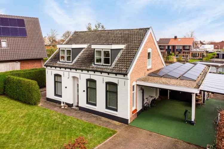 Luxe vrijstaande woning 5 slaapkamers grote tuin aan water