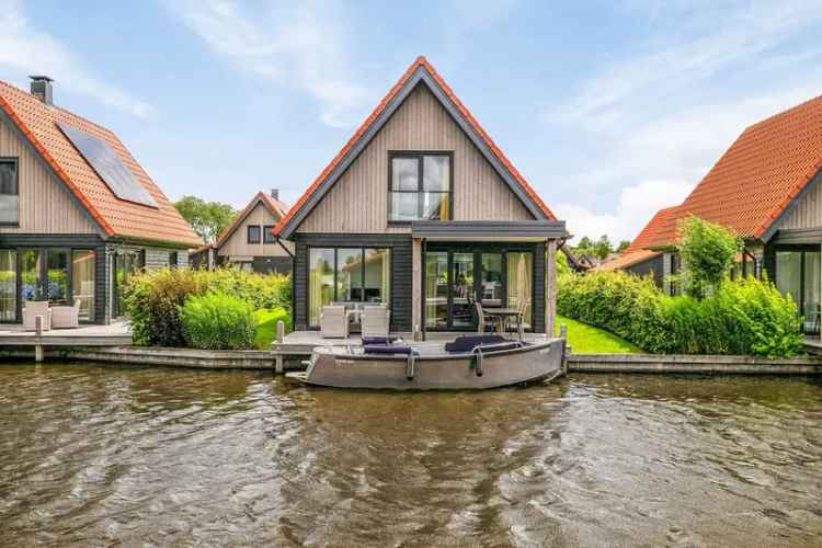 Luxe Recreatievilla Ossenzijl Aan Het Water Met Sloep