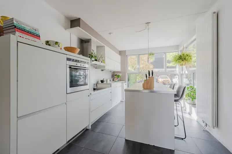 Grote gezinswoning Den Hoorn 4 slaapkamers tuin aan water