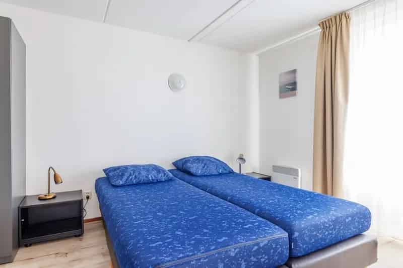 Appartement Ameland State Nes: Strand dichtbij 2 badkamers