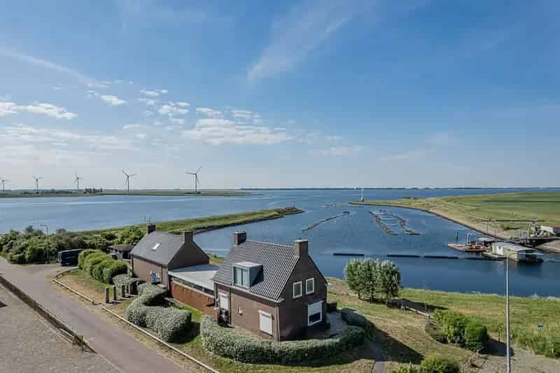 Designwoning Oosterschelde: Vrij uitzicht, werkruimte & gastenverblijf